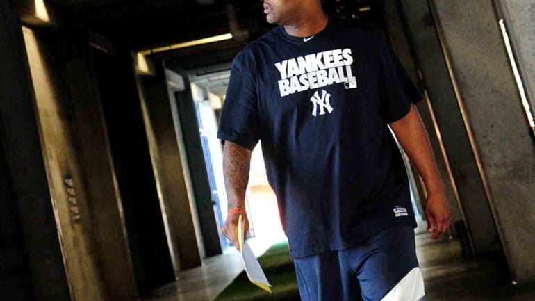 Yankees ace C.C. Sabathia arrives for spring training at George...