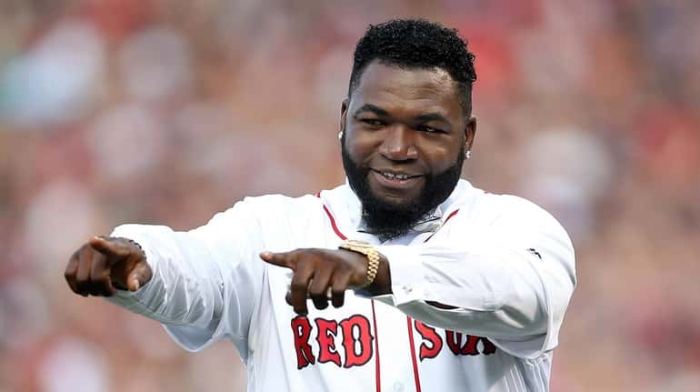 Former Boston Red Sox player David Ortiz reacts during his jersey...