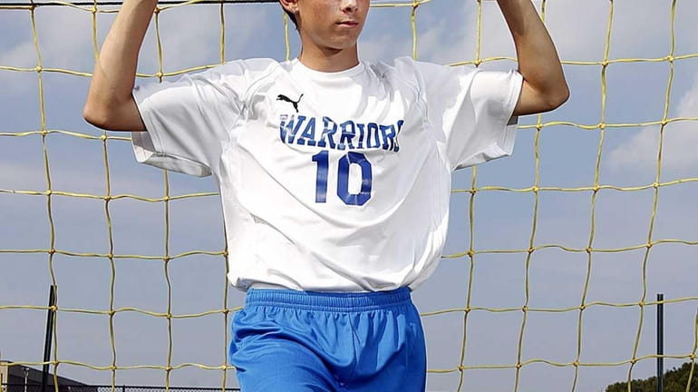 Comsewogue varsity soccer player James Thristino poses for a portrait....