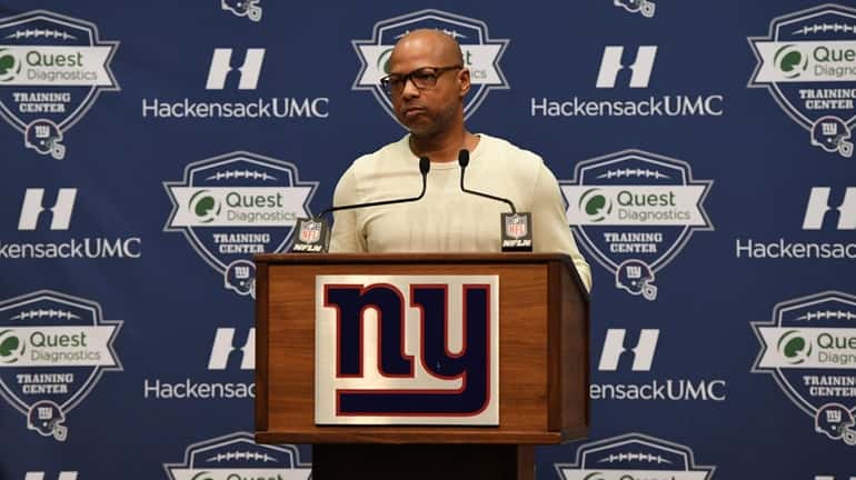 New York Giants General Manager Jerry Reese answers questions from...