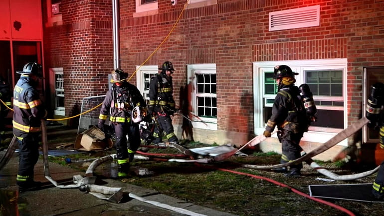 Firefighters responded to an early morning basement fire Monday at Westbury...