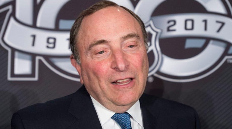 NHL Commissioner Gary Bettman speaks with the media following the...