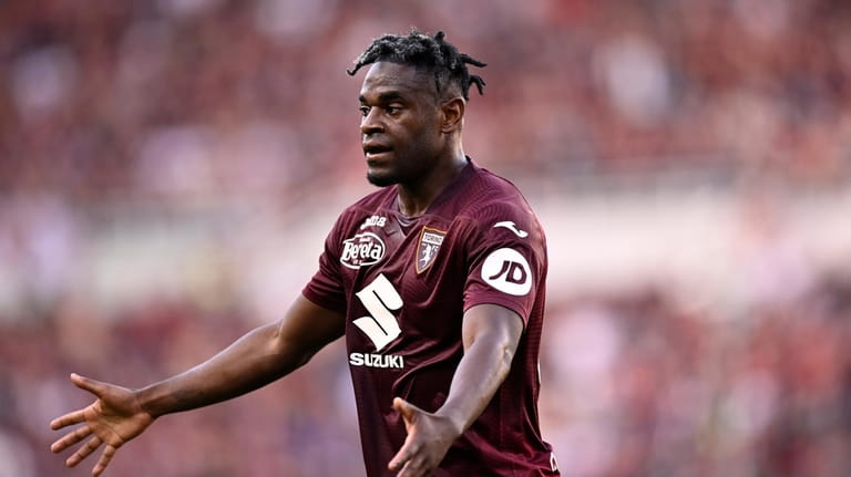 Torino's Duvan Zapata reacts during the Serie A soccer match...
