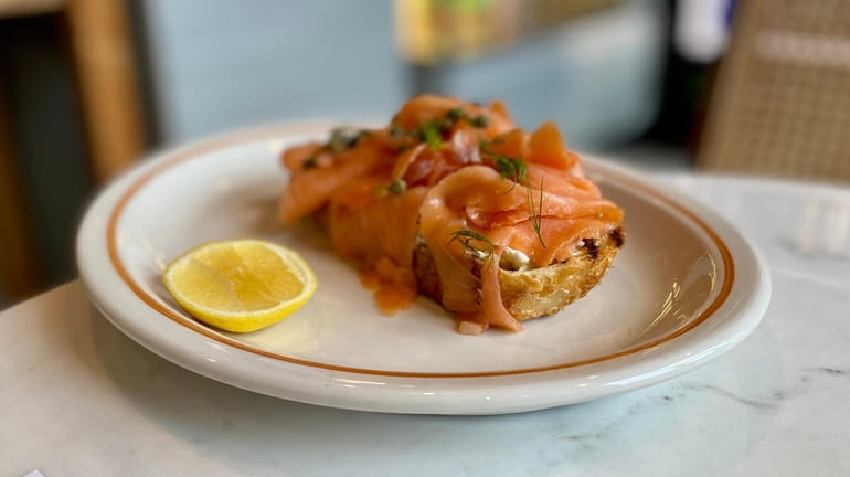 Lox toast with cream cheese and capers at Roto Grocery in...