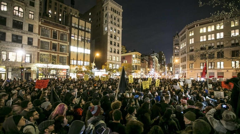 Protesters gather in Lower Manhattan on Tuesday, Nov. 25, 2014,...