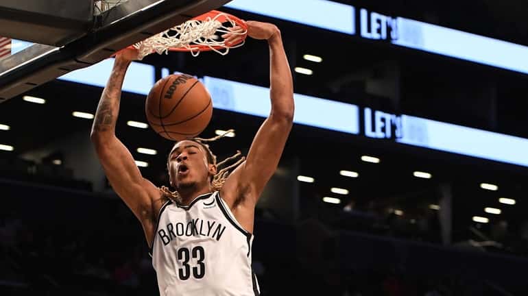 Nets forward Nic Claxton Claxton averaged 6.5 points, 5.5 rebounds and...