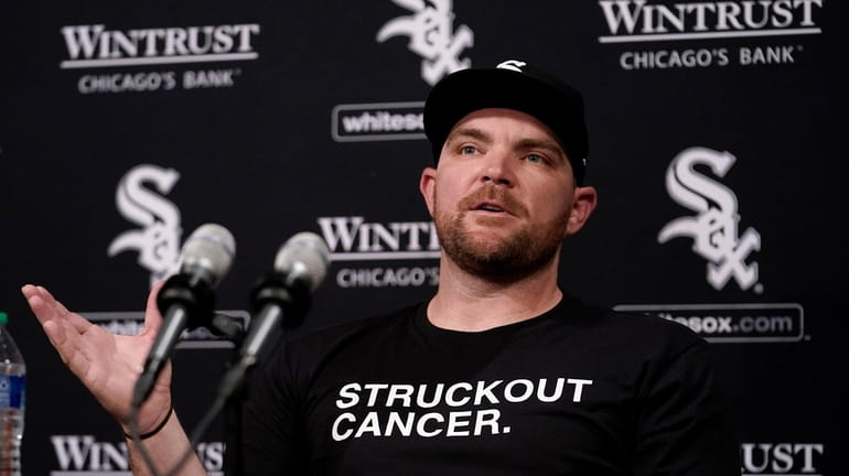 Chicago White Sox's Liam Hendriks talks to reporters before a...