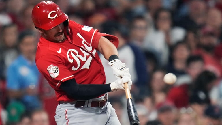 Cincinnati Reds' Spencer Steer connects for a two-run home run...