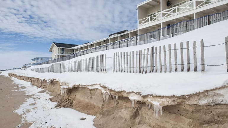 Erosion from ocean waves caused by a blizzard in front...