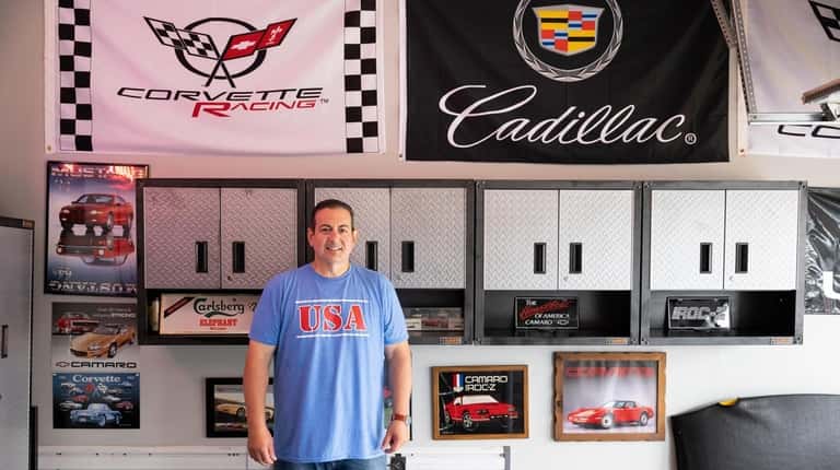 Robert Roth in his modified garage in Manorville.