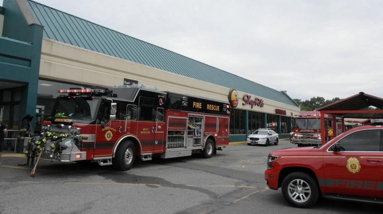 The West Babylon Fire Department and ambulances from several departments...