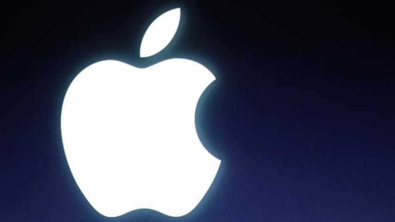 The Apple logo is seen during an announcement at Apple...