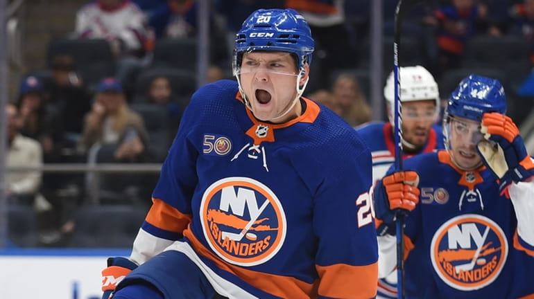 Kieffer Bellows of the New York Islanders reacts after scoring...