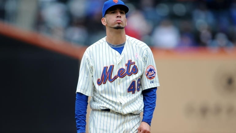 New York Mets starting pitcher Oliver Perez (46) reacts while...