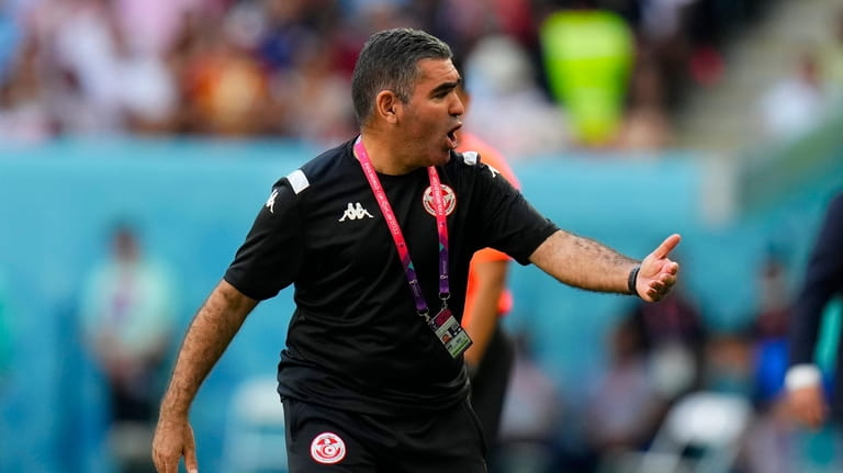 Tunisia's head coach Jalel Kadri reacts during the World Cup...