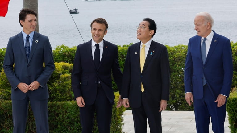 From left, Canada's Prime Minister Justin Trudeau, France's President Emmanuel...