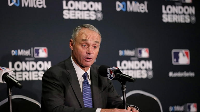 Major League Baseball commissioner Rob Manfred speaks during a news...