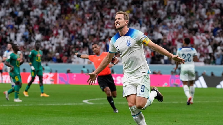 England's Harry Kane celebrates scoring his side's second goal during...