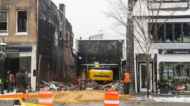 The remains of the Sag Harbor Cinema are removed after...