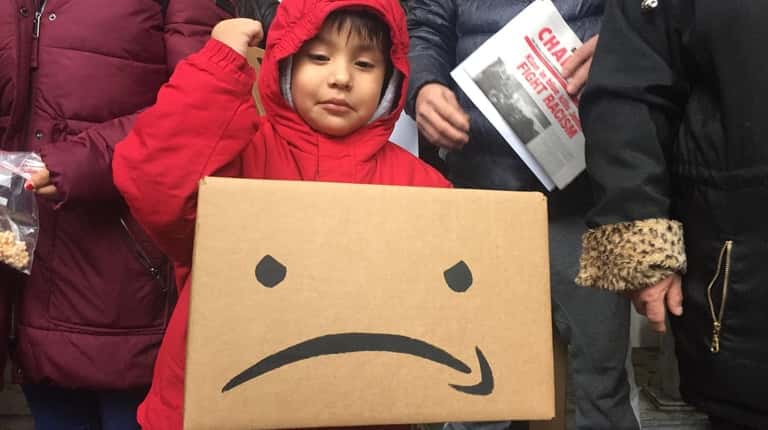 Steven Gill, 4, of Brooklyn joins a protest in Manhattan...