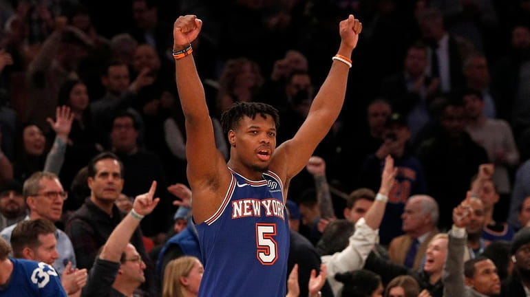 Dennis Smith Jr. #5 of the Knicks reacts late in...