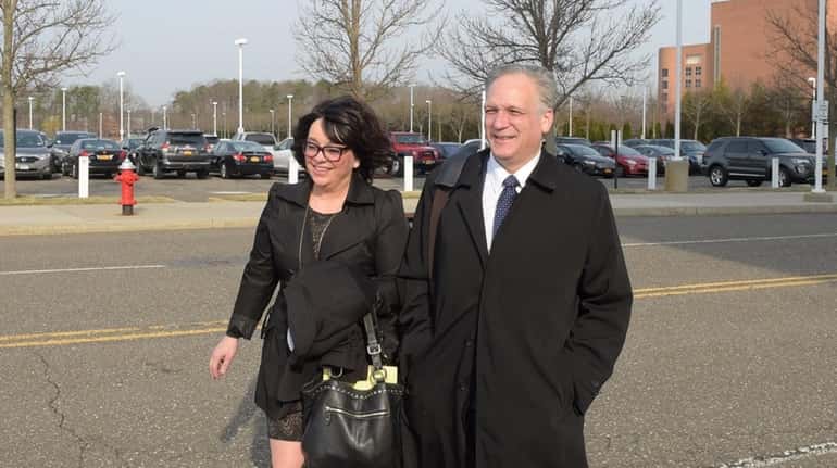 Linda and Edward Mangano arrive at federal court in Central...