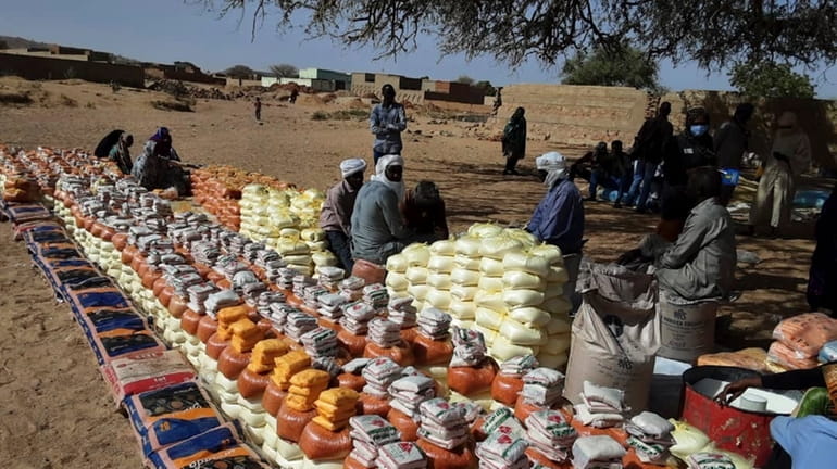 This handout photo provided by World Relief shows emergency food...