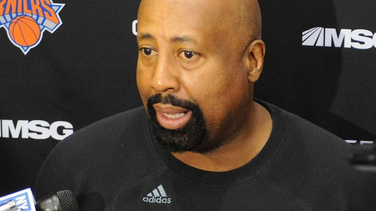 Mike Woodson speaks to the media during a practice at...