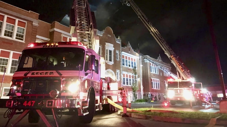 Firefighters respond to a blaze at Hempstead's Prospect Elementary School on...
