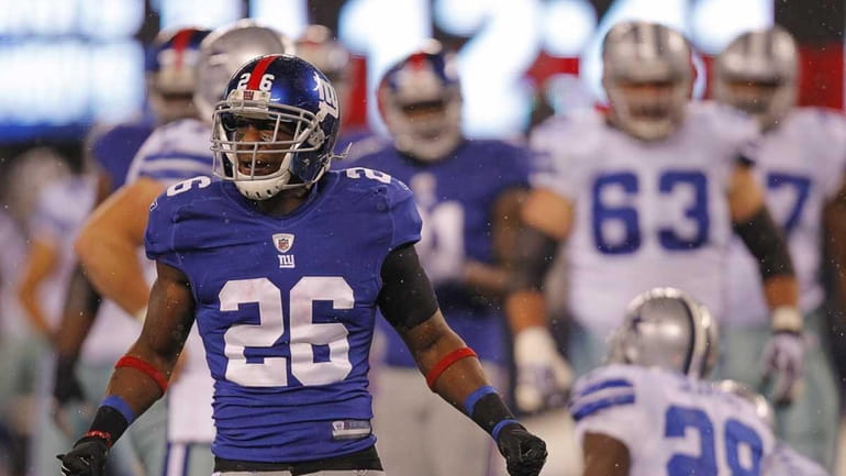 New York Giants free safety Antrel Rolle celebrates after stopping...