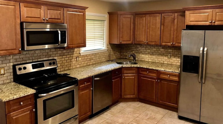 The kitchen inside an Islip home available as a whole house rental...