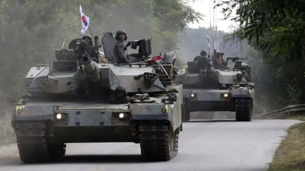 South Korean army's K-1 tanks move during a military exercise...