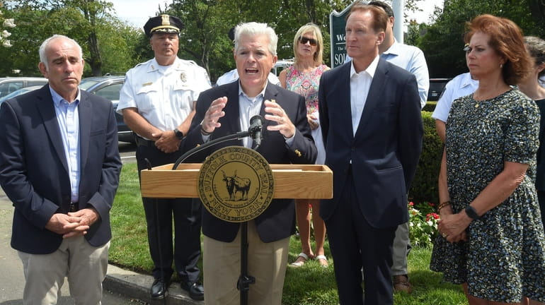 Suffolk County Executive Steve Bellone, with other local officials, announces...