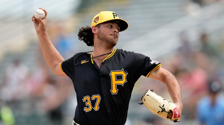 Pittsburgh Pirates starting pitcher Jared Jones throws during the first...