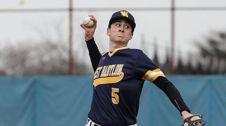 West Babylon pitcher Brandon Hancock throws to the plate during...