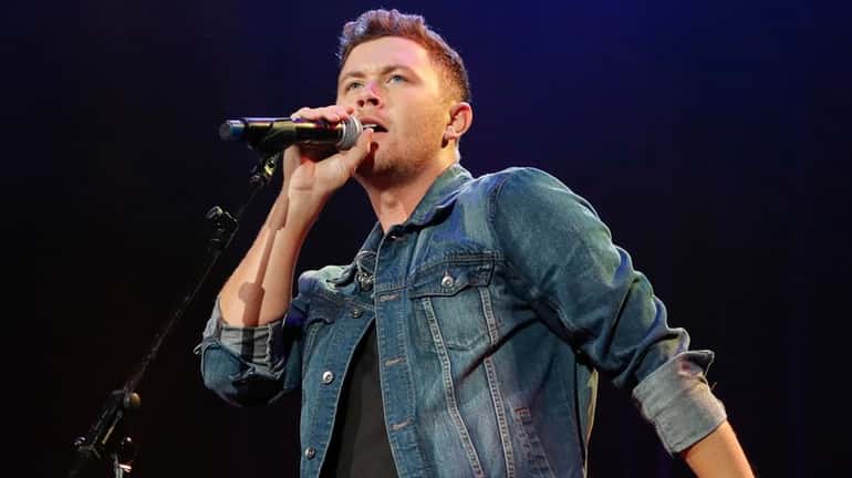 Scotty McCreery performs at the 2018 Nashville Songwriter Awards at...