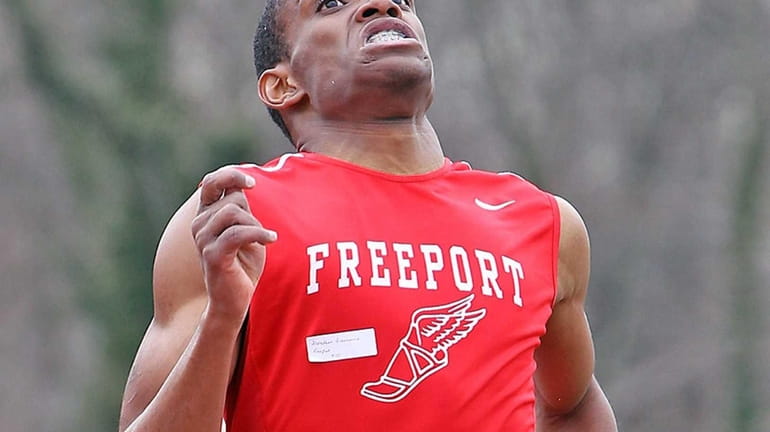 Freeport's Jonathan Greenwood takes first in the boys 800 meters...