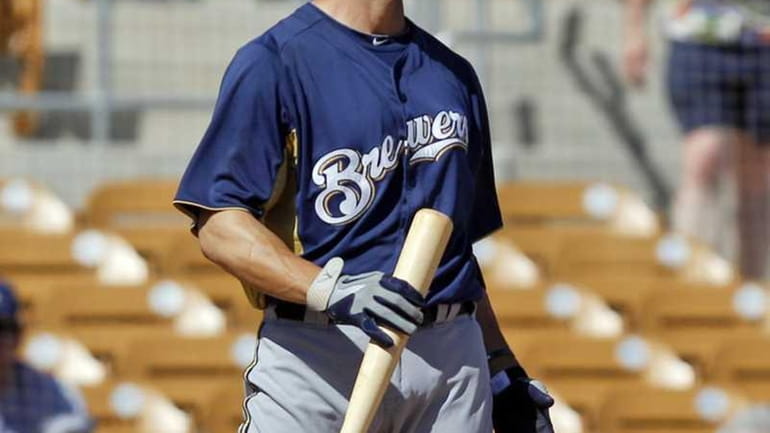 Milwaukee Brewers' Ryan Braun confronts Los Angeles Dodgers pitcher Chris...