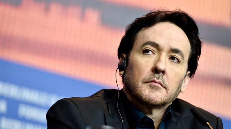 Actor John Cusack attends the news conference for the film...