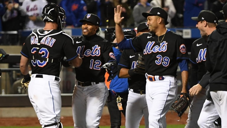 New York Mets celebrate their first combined no-hitter in franchise...