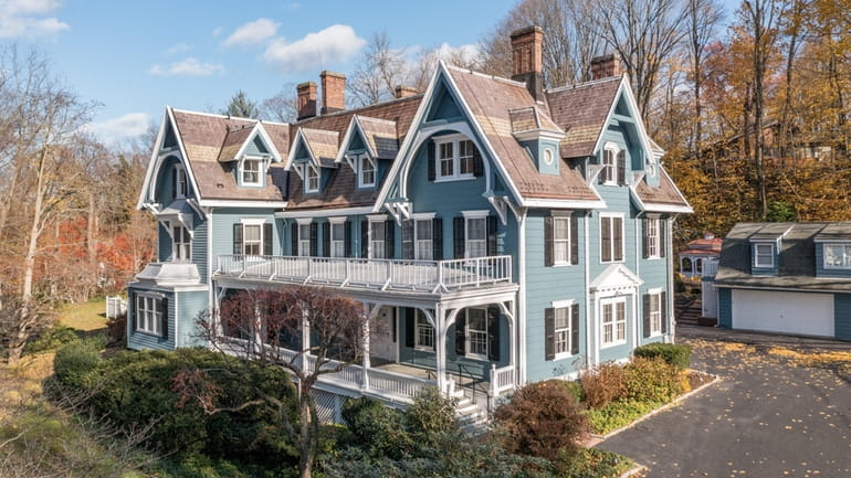 With winter views of Hempstead Harbor, the house sits on...