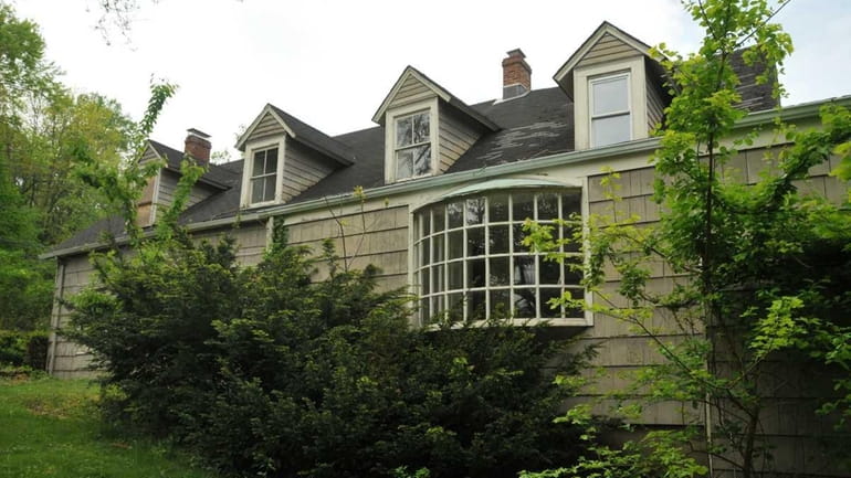 A photo of the side exterior of Mill Pond House...