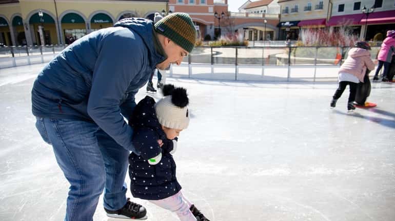 Adam Zacek with 3-year-old daughter, Katiya, at the Deer Park...