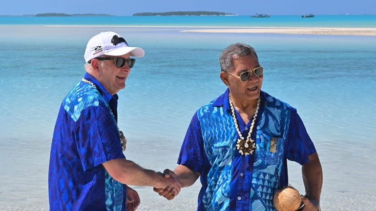 Australia's Prime Minister Anthony Albanese, left, and Tuvalu's Prime Minister...