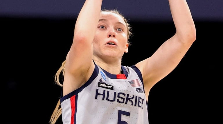 Paige Bueckers of the UConn Huskies shoots during the first...
