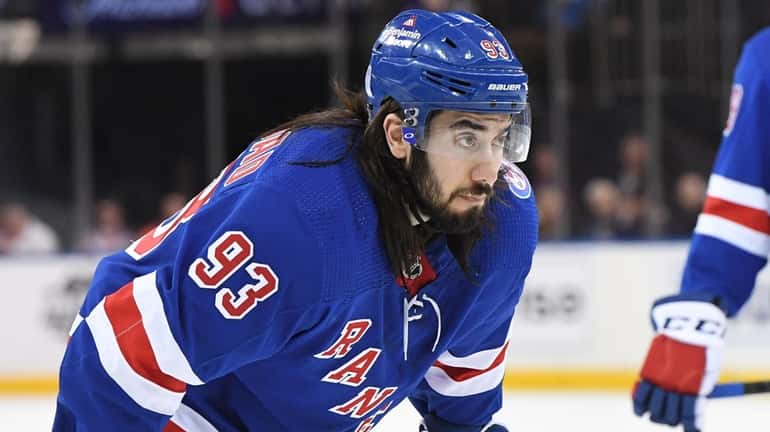 Rangers center Mika Zibanejad looks on before a face off...