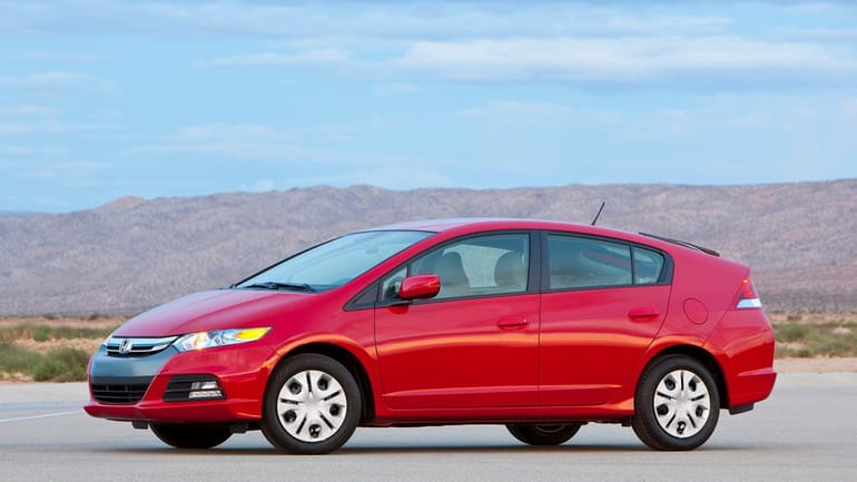 The 2013 Honda Insight, pictured above, looks like a normal...