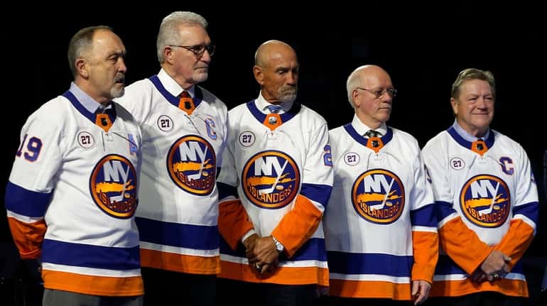 Former Islanders, from left, Bryan Trottier, Clark Gillies, Bobby Nystrom, Billy...