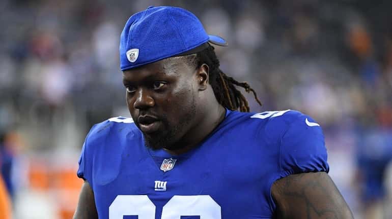 Giants defensive tackle Damon Harrison walks off the field after...
