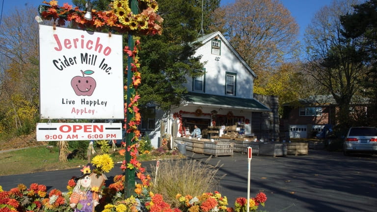The Jericho Cider Mill attracts customers throughout the fall and...